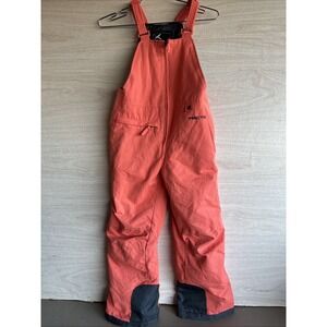 Arctix kids' insulated snow bib overalls in a coral color Sz Small